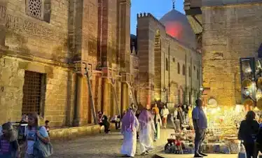 Khan El Khalili Bazaar with shops, souvenirs, and traditional cafés.