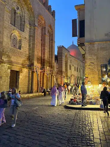 Khan El Khalili Bazaar with shops, souvenirs, and traditional cafés.