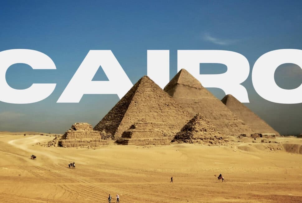 Great Pyramids of Giza with Cairo text in background, iconic landmark of Egypt