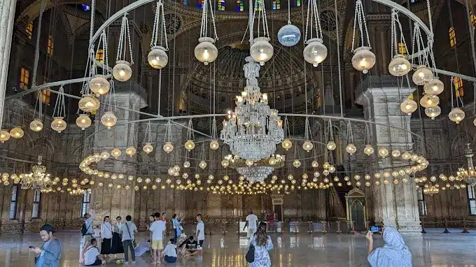 Interior of Muhammad Ali Mosque showing grand dome and chandeliers