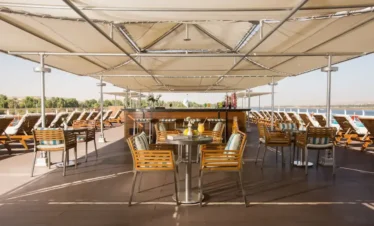 sun deck on Nile cruise with loungers and river view