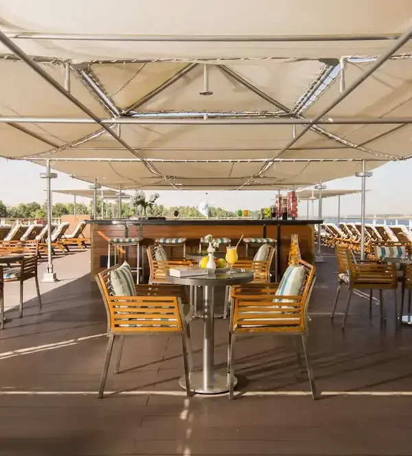 sun deck on Nile cruise with loungers and river view