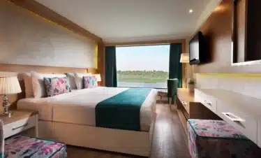 luxury cabin inside Acamar Nile Cruise with panoramic Nile view
