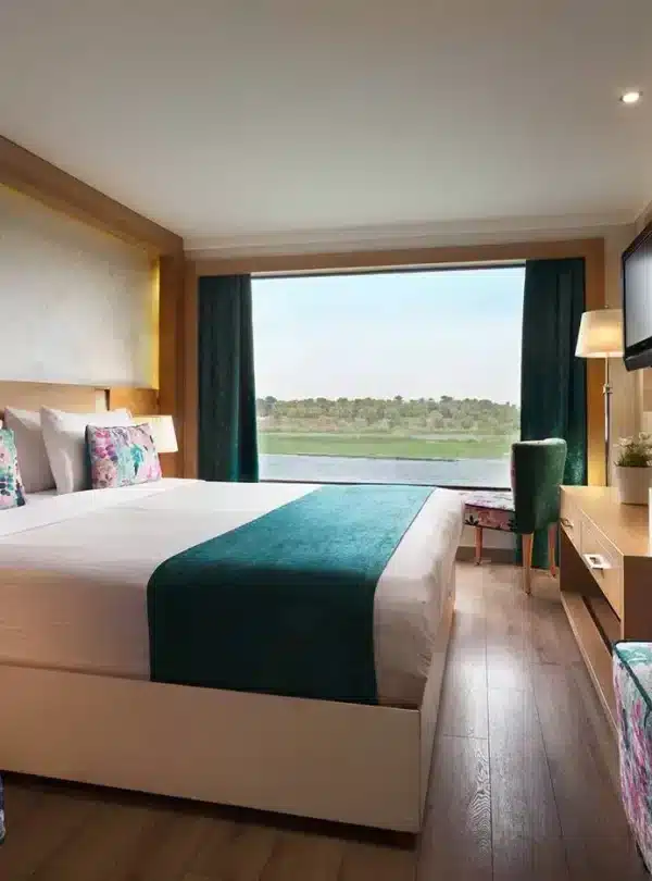 luxury cabin inside Acamar Nile Cruise with panoramic Nile view