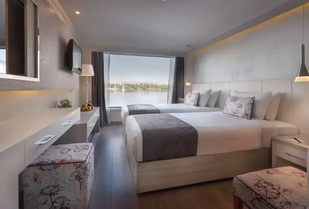 luxury cabin inside Acamar Nile Cruise with panoramic Nile view