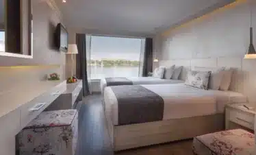 luxury cabin inside Acamar Nile Cruise with panoramic Nile view