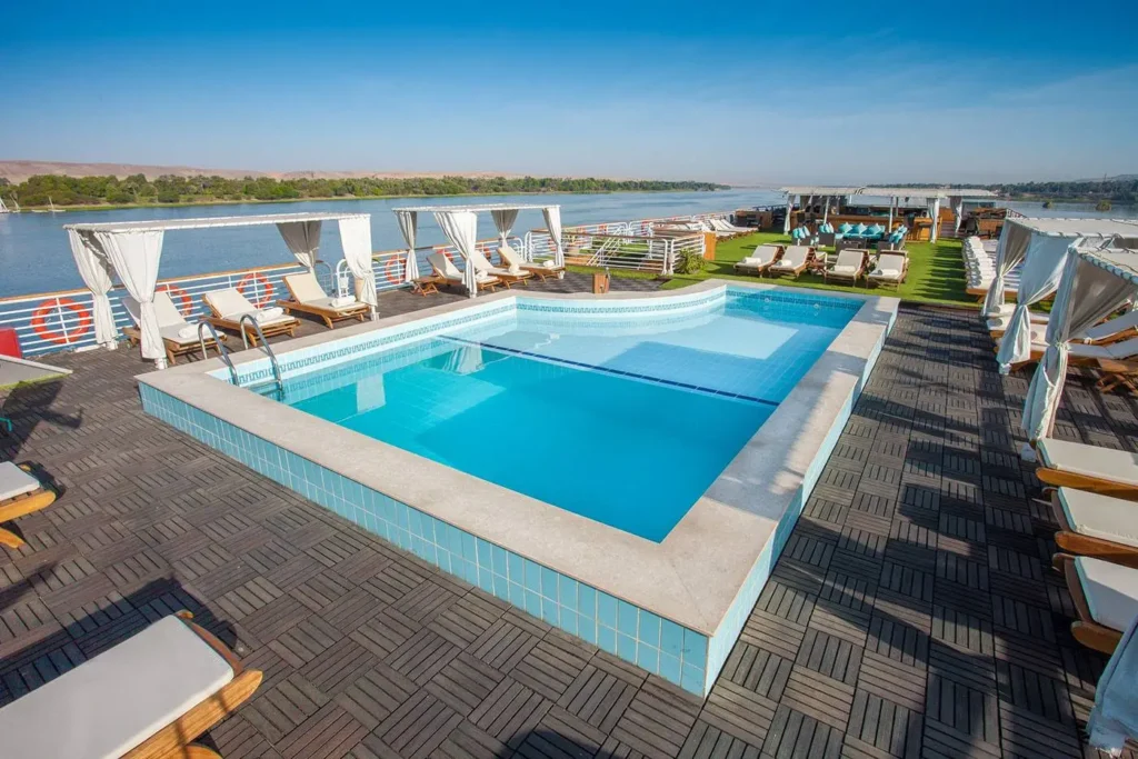 swimming pool and relaxation area on Acamar Nile Cruise